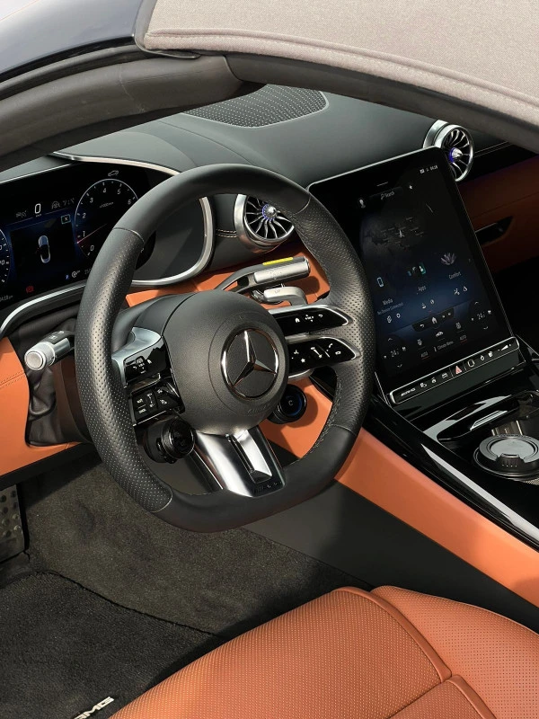Blue Mercedes SL 43 AMG, 2024 Photo 1